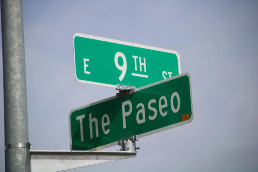 Kansas City has begun taking down Martin Luther King Boulevard signs and putting back up Paseo Boulevard signs. Image by Michelle Tyrene Johnson / KCUR 89.3. United States, 2020.