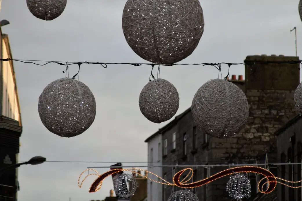 The streets of Galway are adorned in festive spirit each holiday season, but for some, the time of year is becoming more secular. Image by Michael Bodley. Ireland, 2016. Media file: irish_christmas_decorations.jpg