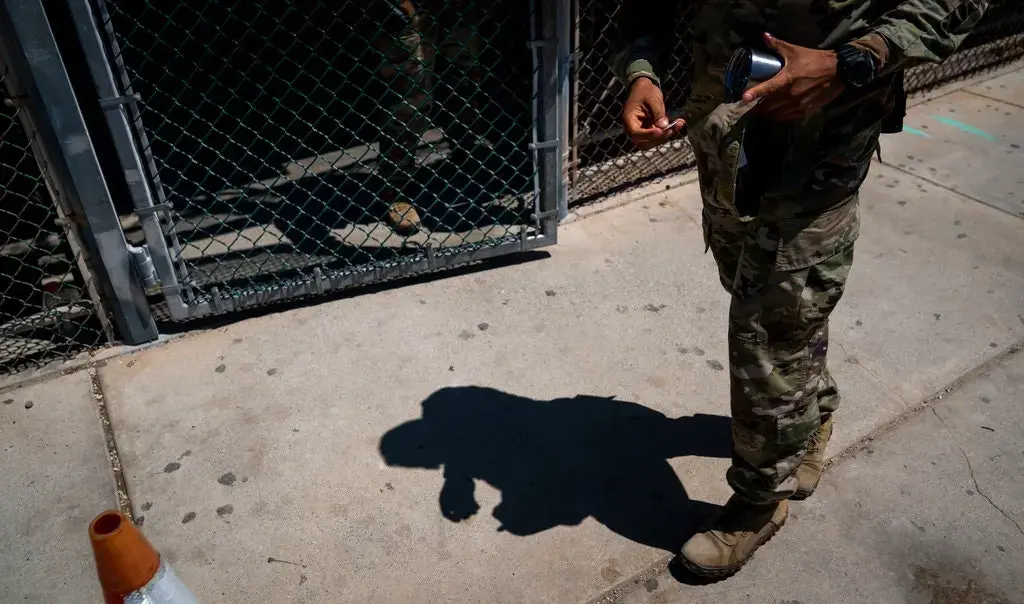 A military police officer leaving the Camp 6 detention center at Guantánamo Bay in April. The most secretive detention area, Camp 7, is off limits to the news media. Image by Doug Mills/The New York Times. Cuba, 2020. A military police officer leaving the Camp 6 detention center at Guantánamo Bay in April. The most secretive detention area, Camp 7, is off limits to the news media. Image by Doug Mills/The New York Times. Cuba, 2020.
