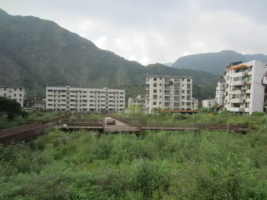 This ghost town sits just 10 miles away from this new town where the survivors are trying to move forward after the devistating earthquake hit in 2008. Image by Daniel Brook. China, 2017.
