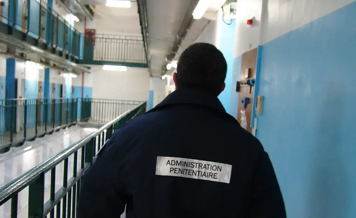 A warder patrolling a cell block at Fresnes, one of France’s biggest jails, during a visit I made earlier this month. Image by Christopher de Bellaigue. France, 2016. Media file: bellaigue.jpg