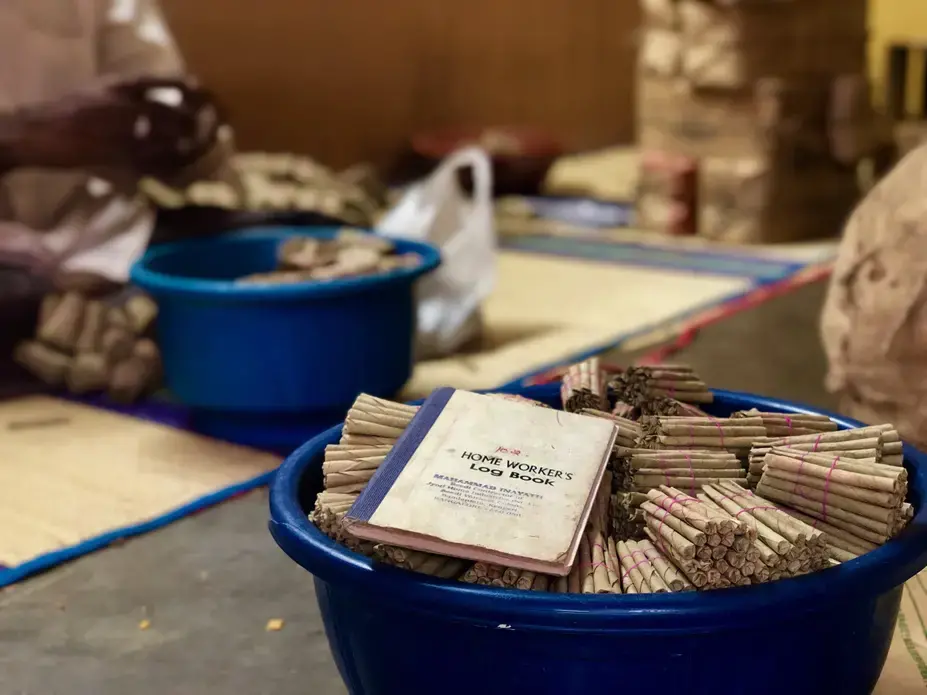 The log book of unregistered and home-based beedi workers used to keep a record of the number of beedis rolled. Image by Pallavi Puri. India, 2019.