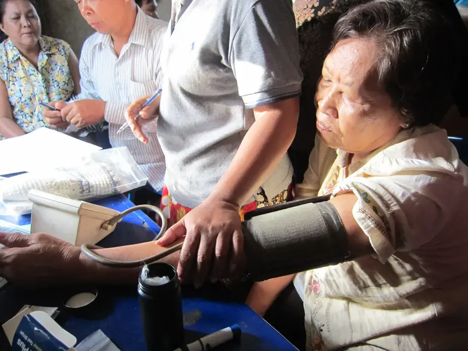 A self-help blood pressure/diabetes clinic in a Phnom Penh slum. Image by Kounila Keo. Cambodia, 2013. Media file: IMG_0670.JPG