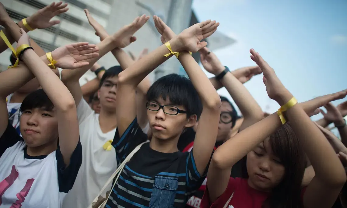 Joshua Wong (center) leading pro-democracy protests in Hong Kong. Image by Anthony Kwan/Getty Images. China, 2014. Joshua Wong (center) leading pro-democracy protests in Hong Kong. Image by Anthony Kwan/Getty Images. China, 2014.