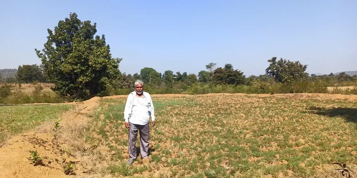 55-year old Ramsingh Nagvanshi, a Dalit farmer, at his farm. His family has cultivated the land for generations, but has no land title because it falls under orange areas. Image by Nihar Gokhale. India, undated. 55-year old Ramsingh Nagvanshi, a Dalit farmer, at his farm. His family has cultivated the land for generations, but has no land title because it falls under orange areas. Image by Nihar Gokhale. India, undated.