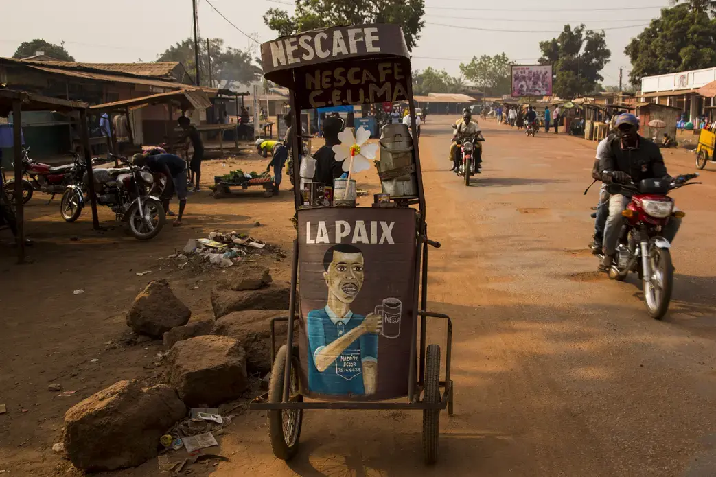 A coffee cart in Bangui, one of many wheeled around the bustling, dusty capital city. The front reads "La Paix" - "Peace". Image by Jack Losh. Central African Republic, 2018. A coffee cart in Bangui, one of many wheeled around the bustling, dusty capital city. The front reads "La Paix" - "Peace". Image by Jack Losh. Central African Republic, 2018.