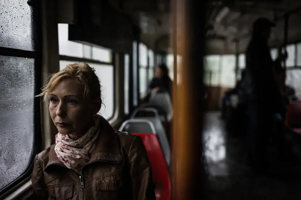 Olga on her way to a shelter for war-displaced people in Odessa. Image by Misha Friedman. Ukraine, 2016. Olga on her way to a shelter for war-displaced people in Odessa. Image by Misha Friedman. Ukraine, 2016.