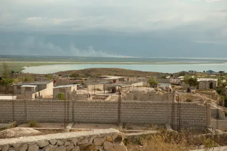 A view from the hilltop Village de Pecheur neighborhood of greater Canaan. Image by Allison Shelley. Haiti, 2019.