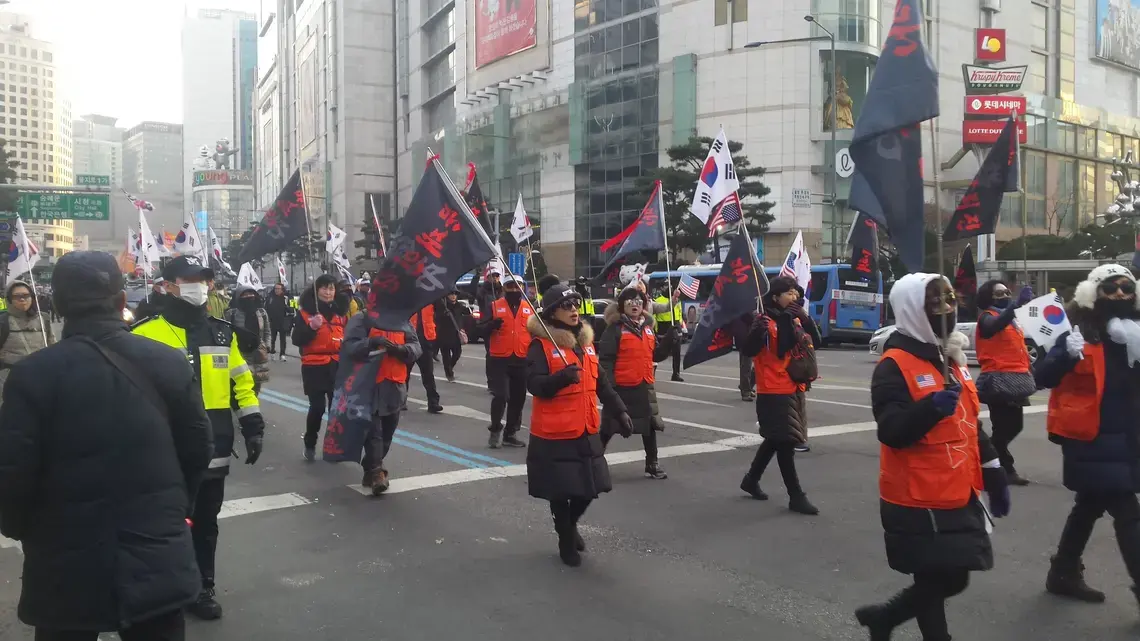 Protesters voice their opposition to the current liberal South Korean government's "Sunshine" policy of pursuing peace talks with North Korea. Image by Rachel Oswald. South Korea, 2018.
