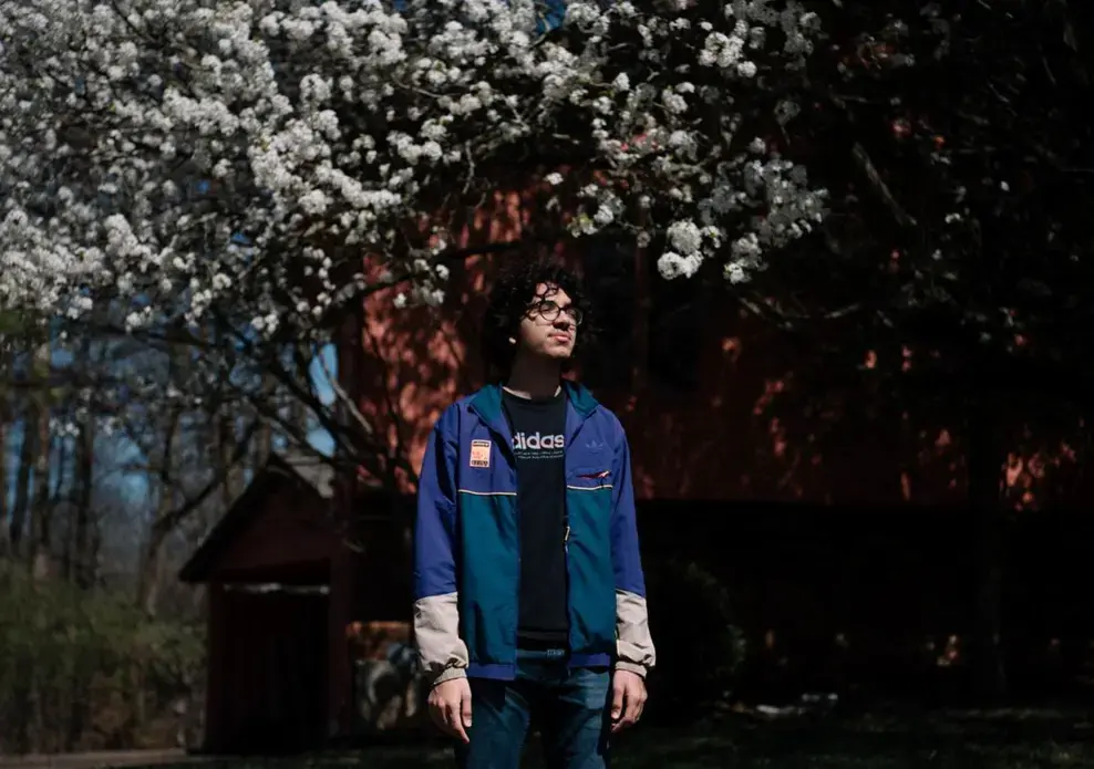 Adam Lahlou, senior class president at Carbondale Community High School, stands for a portrait outside his home in Carbondale. Lahlou, like many seniors across the country, is living in uncertainty for the future of senior year while COVID-19 cases increase daily across the United States. Image by Brian Munoz. United States, 2020. Adam Lahlou, senior class president at Carbondale Community High School, stands for a portrait outside his home in Carbondale. Lahlou, like many seniors across the country, is living in uncertainty for the future of senior year while COVID-19 cases increase daily across the United States. Image by Brian Munoz. United States, 2020.