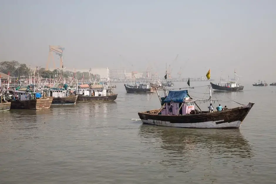 Mazagon Dock, India’s leading shipyard, looms above the Mumbai Port. (The Megacity Initiative). Image by Matthew Niederhauser. India, 2015. Media file: 2f2699b90.jpg