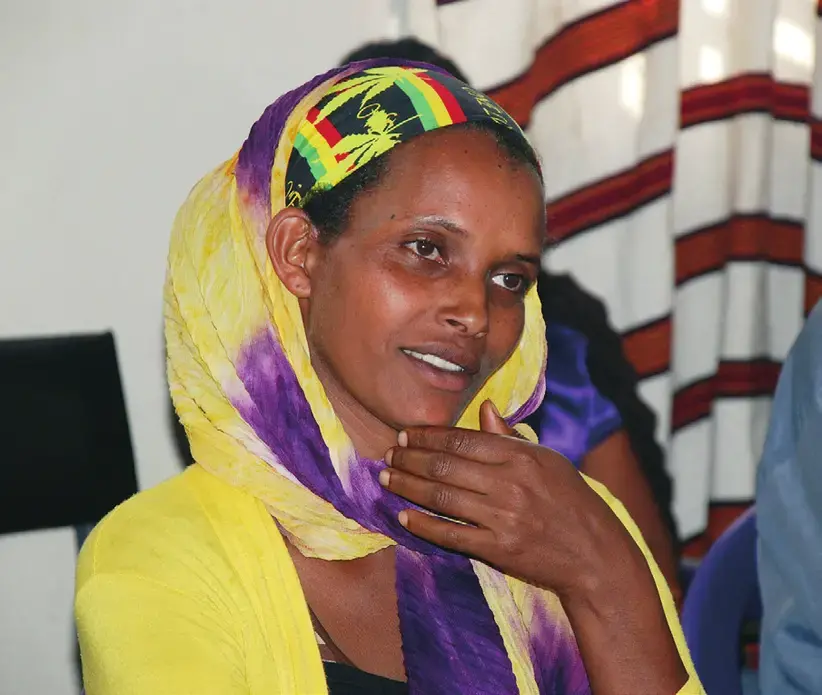 Zeritu Tilahun now has income and better food for her children. Image by Philip Brasher. Ethiopia, 2014. Media file: foodaid-003.png