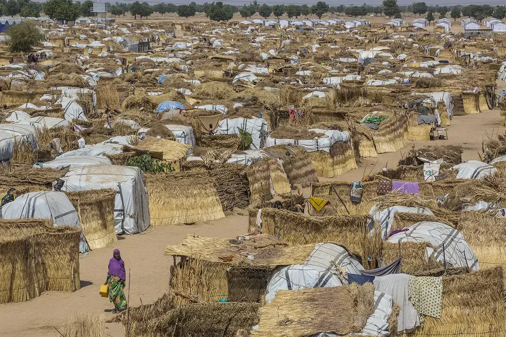 Muna Garage is one of the largest informal camps in Maiduguri, the capital city of Borno state in Nigeria. Nearly 2 million people who have escaped the violence of Boko Haram are internally displaced; thousands have crowded into this camp, where food, water, and sanitation are scarce. Image by Andrew Esiebo/Associated Press. Muna Garage is one of the largest informal camps in Maiduguri, the capital city of Borno state in Nigeria. Nearly 2 million people who have escaped the violence of Boko Haram are internally displaced; thousands have crowded into this camp, where food, water, and sanitation are scarce. Image by Andrew Esiebo/Associated Press.