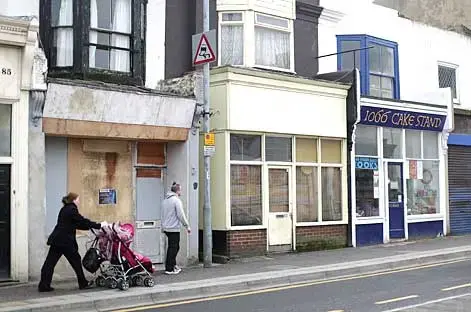 Towns most at risk from cuts often have deprived commercial districts. Image by Charlie Bibby. UK, 2013. Media file: jobs_highSt.jpg