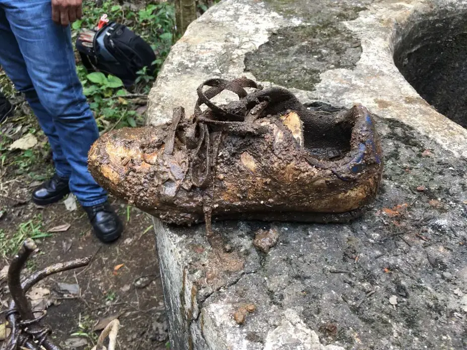 A shoe recovered on a hunt for bodies. A shove reA shoe recovered on a hunt for bodies.
