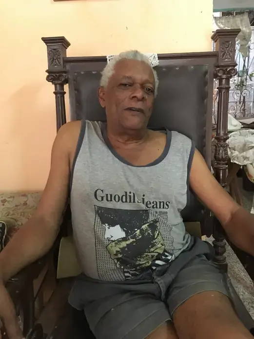 Julio Naranjo, a 73-year-old math teacher who was a messenger for the revolutionary rebels. Image by Sally H. Jacobs. Cuba, 2018.