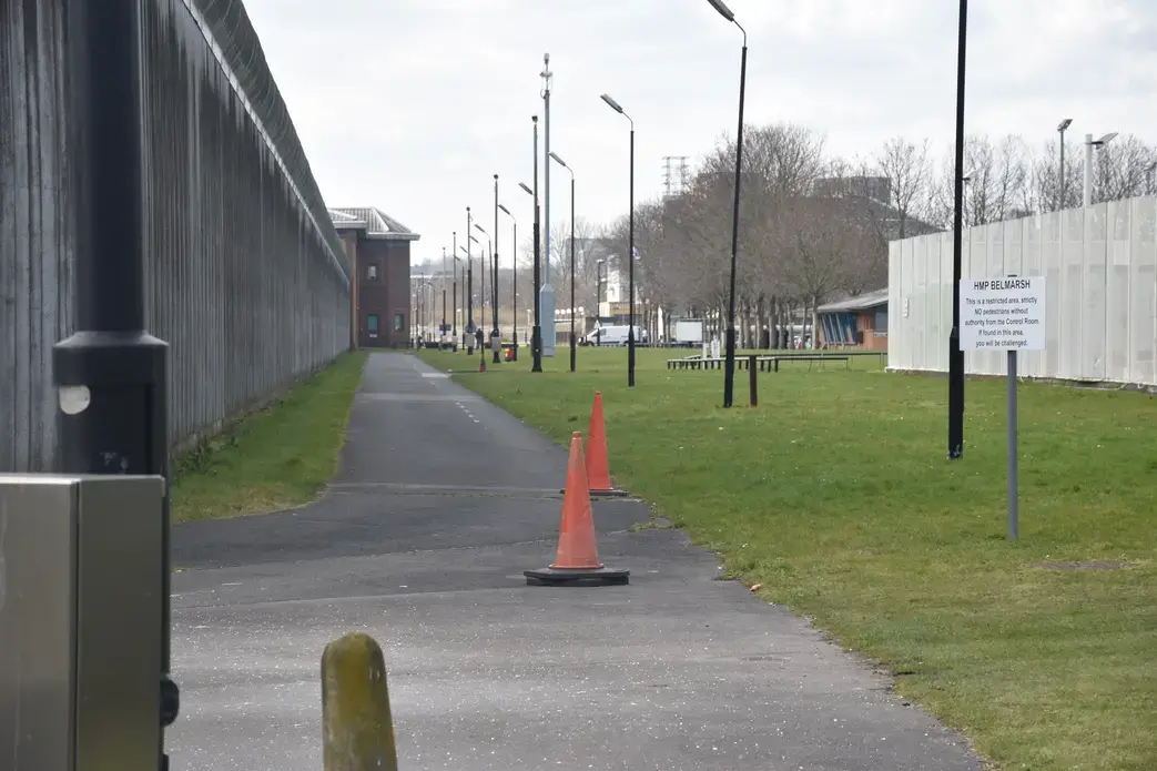 The front wall of H.M.P Belmarsh, running hundreds of yards around the maximum security facility.