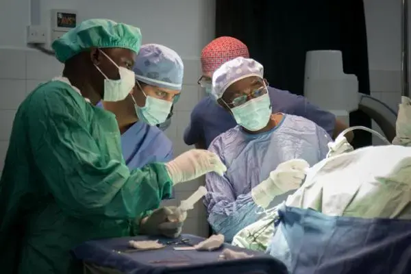Surgeons come from all over the world to the CURE Children's Hospital in Mbale, Uganda, where doctors developed a new treatment for hydrocephalus. Image by Bridget Huber. Uganda, 2014. Media file: uganda_s-0111_0.jpg