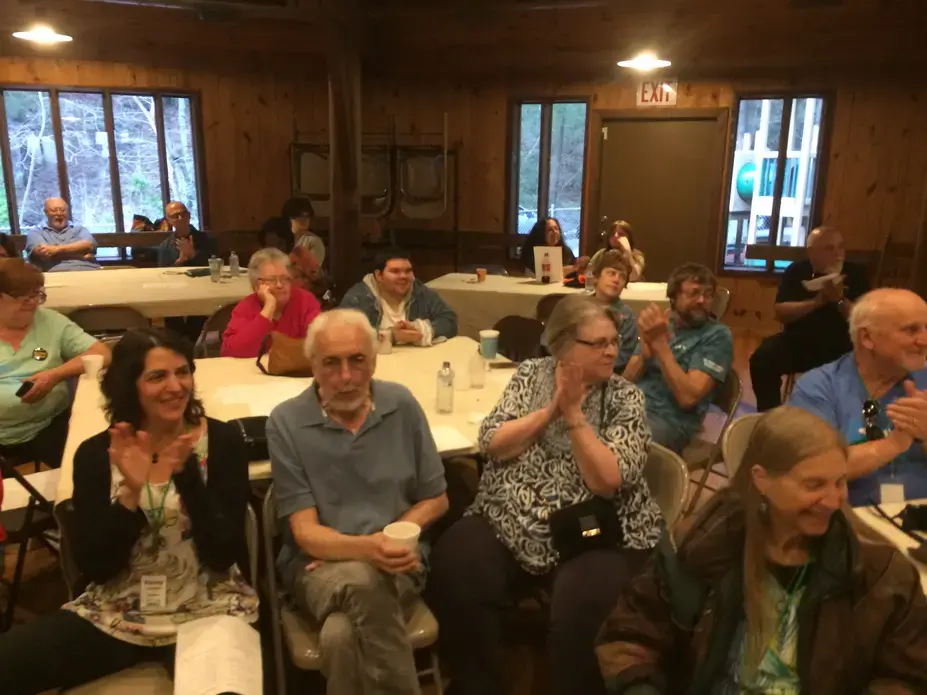 Letcher County and Leverett residents enjoy singing together at Cowan Community Center in Eastern Kentucky. Image by Richie Davis. United States, 2018.