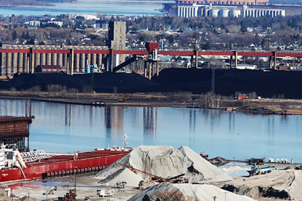 A stockpile of coal at the Midwest Energy Resources Company terminal in Superior, Wisconsin. The business is the largest mover of coal on the Great Lakes. Image by Paul Walsh. United States, undated.