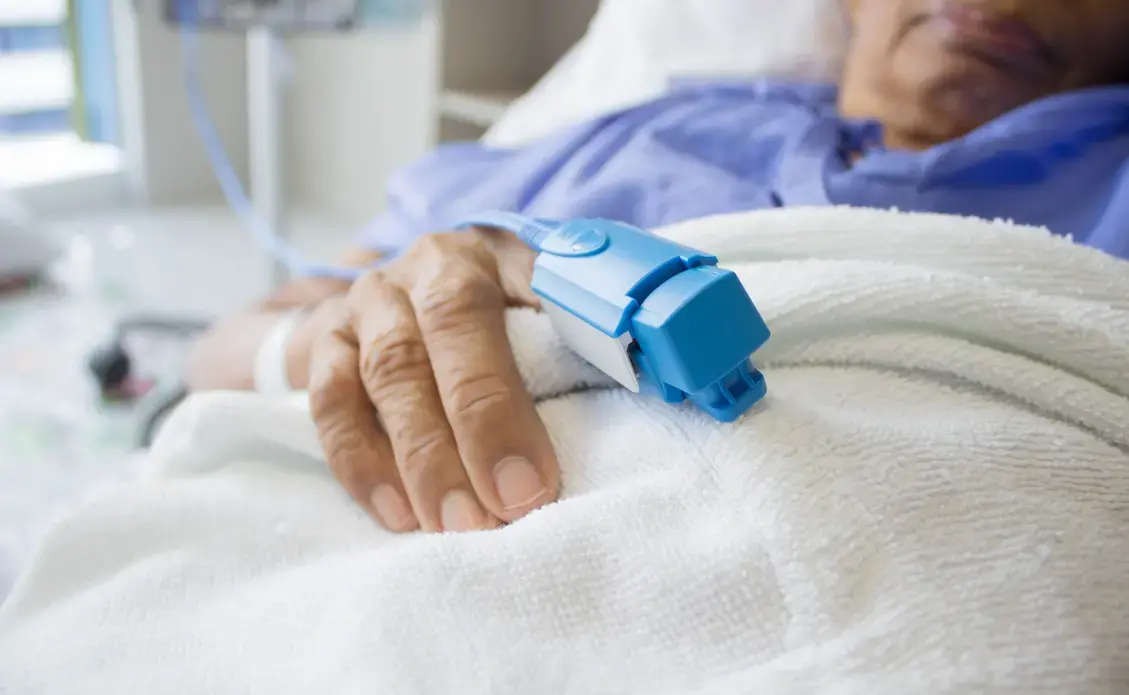 A finger pulse oximeter monitoring a patient's vital signs. Image courtesy Shutterstock. A finger pulse oximeter monitoring a patient's vital signs. Image courtesy Shutterstock.
