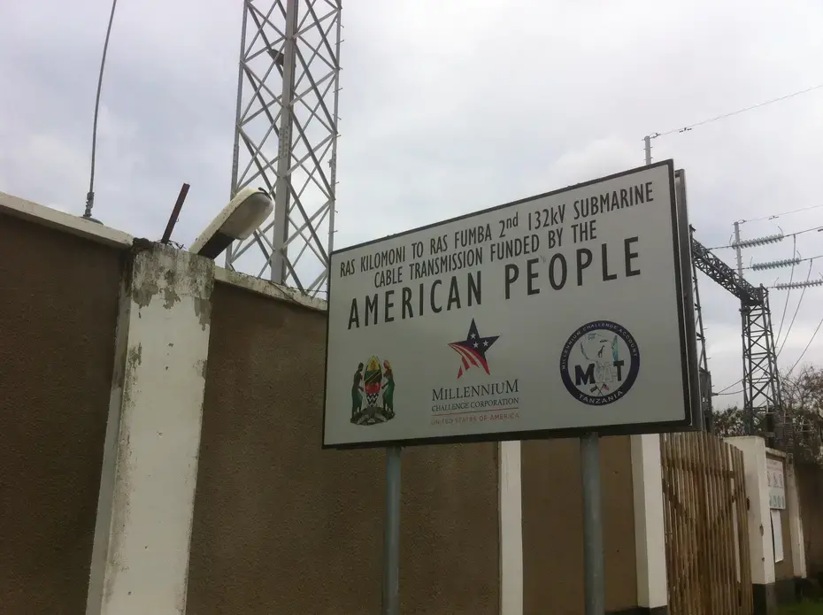"Funded by American People." The Millennium Challenge Corporation marks its work in Tanzania. Image by Matt Kennard. Tanzania, 2015. Media file: -funded_by_american_people-._the_millennium_challenge_corporation_marks_its_work_in_tanzania.jpg