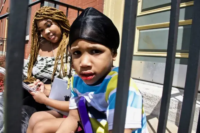 Courtnesha Rogers says Angelo (pictured), Angele and Angelino want to be around people. "They don't understand why they can't see their friends." Image by Wiley Price / St. Louis American. United States, 2020. Courtnesha Rogers says Angelo (pictured), Angele and Angelino want to be around people. "They don't understand why they can't see their friends." Image by Wiley Price / St. Louis American. United States, 2020.