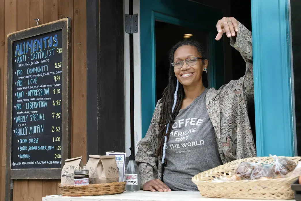 Blew Kind, owner of Franny Lou’s Porch Cafe & Community Space, 2400 Coral St., Phila. Pa., was photographed at the cafe’s take out window on May 8, 2020. Image by Elizabeth Robertson / The Philadelphia Inquirer. United States, 2020. Blew Kind, owner of Franny Lou’s Porch Cafe & Community Space, 2400 Coral St., Phila. Pa., was photographed at the cafe’s take out window on May 8, 2020. Image by Elizabeth Robertson / The Philadelphia Inquirer. United States, 2020.