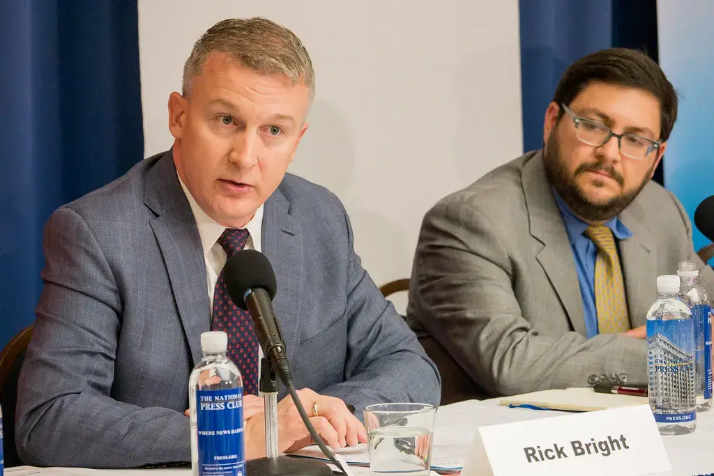 Rick Bright (left), former director of the Biomedical Advanced Research and Development Authority (BARDA), alleges in a whistleblower complaint that officials punished him for refusing to deliver funds to pharmaceutical firms run by "cronies." Image by Alliance for Health Policy / Creative Commons. United States, 2016. Rick Bright (left), former director of the Biomedical Advanced Research and Development Authority (BARDA), alleges in a whistleblower complaint that officials punished him for refusing to deliver funds to pharmaceutical firms run by "cronies." Image by Alliance for Health Policy / Creative Commons. United States, 2016.
