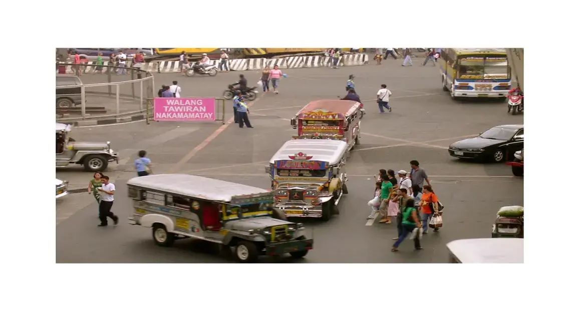 The sign says, “No crossing. Deadly.” Walking in Metro Manila can be hazardous to one’s health: 57,877 pedestrians were injured or killed in the megacity from 2005 to 2015. That comes out to about 15 people a day. Image by Dinna Louise C. Dayao. Philippines, 2012.