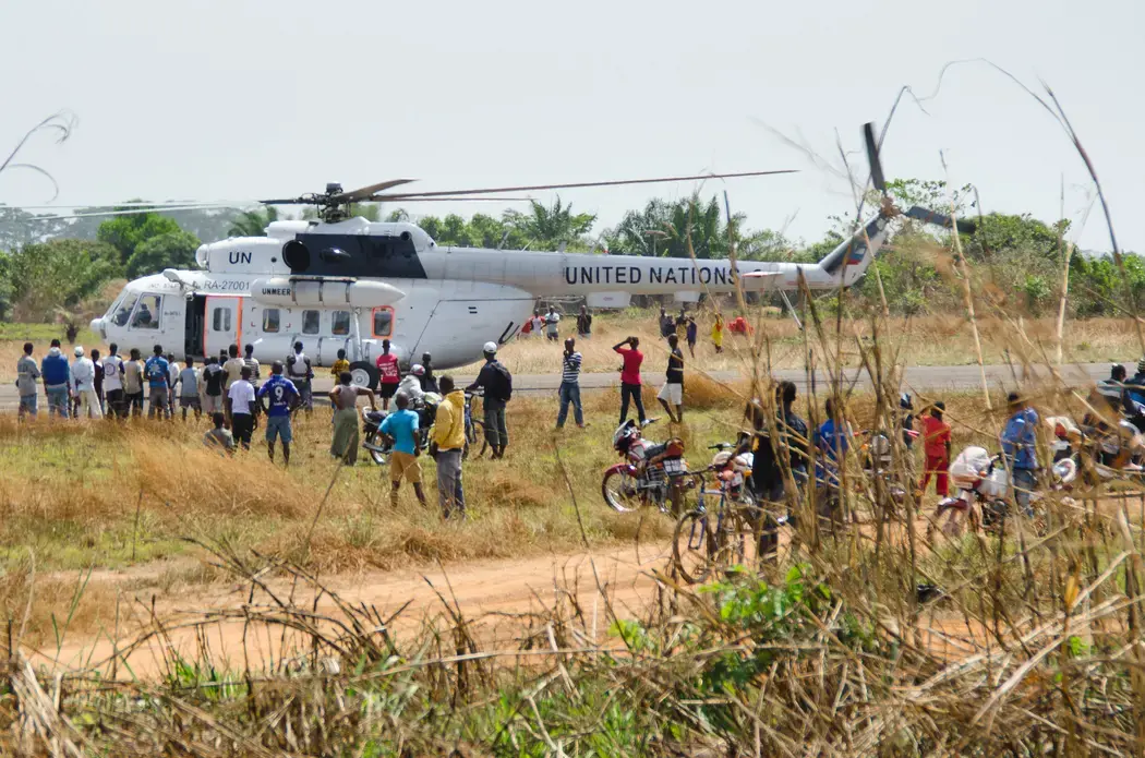 A UN helicopter made frequent trips between the capital and a city in eastern Sierra Leone, where health workers in the public health system went without pay. Image courtesy of Amy Maxmen. Sierra Leone, 2015. Media file: un_helicopter.jpg