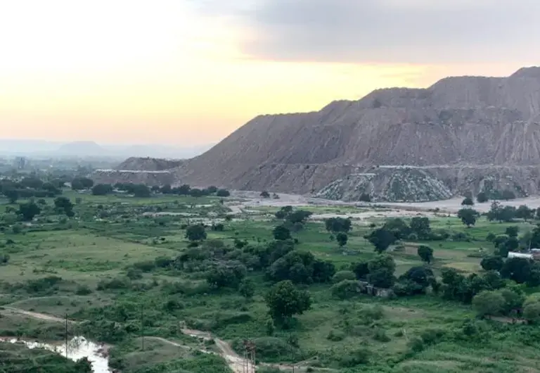 Decades of mining has changed the landscape of what was once a forested area of Madhya Pradesh, in central India. Electricity producer THDC India Limited plans to build another opencast mine, like the one pictured above, in Singrauli, India’s fourth most-critically polluted area. Image by Tish Sanghera. India, 2019. Decades of mining has changed the landscape of what was once a forested area of Madhya Pradesh, in central India. Electricity producer THDC India Limited plans to build another opencast mine, like the one pictured above, in Singrauli, India’s fourth most-critically polluted area. Image by Tish Sanghera. India, 2019.