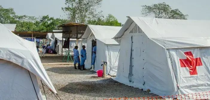 An Ebola treatment center run by the Red Cross and Red Crescent Societies in Sierra Leone. It contained zero patients in February. Hundreds of millions in donations went to the construction and operation of NGO-run centers in the three hard-hit countries. Image by Amy Maxmen. Sierra Leone, 2015. An Ebola treatment center run by the Red Cross and Red Crescent Societies in Sierra Leone. It contained zero patients in February. Hundreds of millions in donations went to the construction and operation of NGO-run centers in the three hard-hit countries. Image by Amy Maxmen. Sierra Leone, 2015.