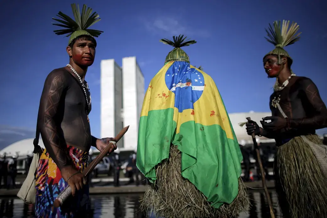 Indigenous leaders gathered at Brazil's National Congress in Brasília in April, demanding more land for isolated tribes and settled communities. Image by Ueslei Marcelino/Reuters. Brazil, 2015. Media file: licensed_from_reuters_2.jpg
