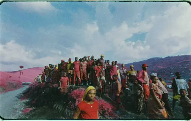 Still from "The Enclave," shot on 16mm color infrared film in Eastern Congo. Image by Richard Mosse. DRC, 2012. Media file: mosse.jpg