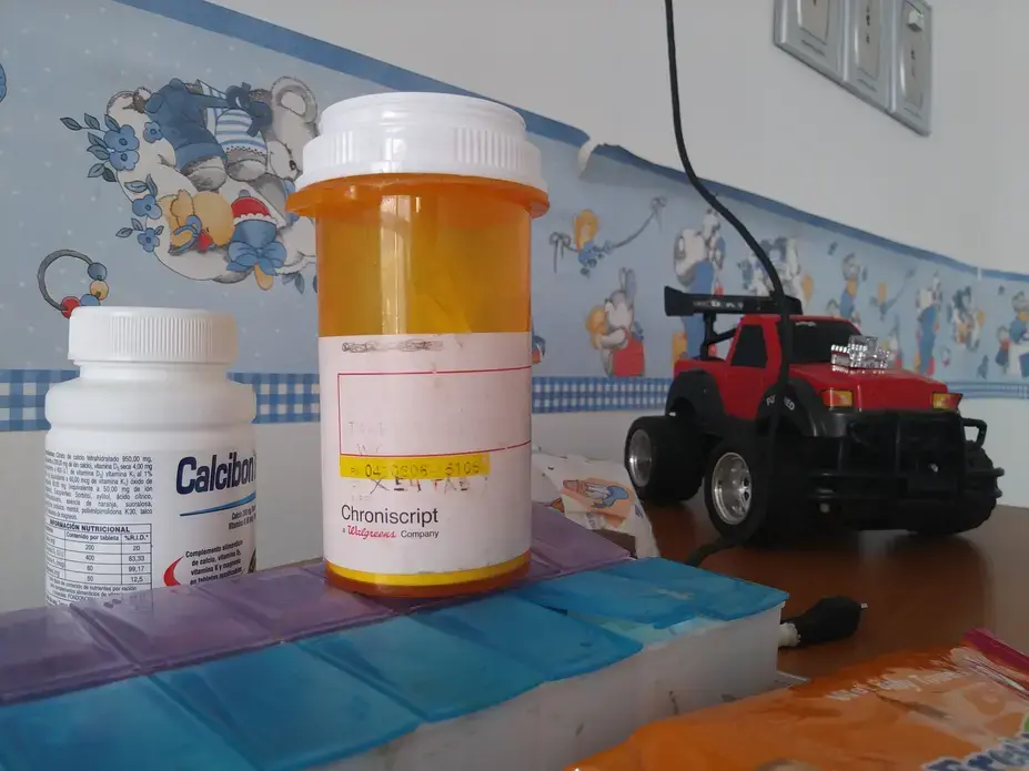 Eliécer Aguiar's medicine and toys on a table, at his hospitalization room in the Hospital J.M de los Ríos, in Caracas. Twelve-year-old Eliécer suffers from chronic kidney diesease and needs a kidney transplant, but with Venezuela's transplant system almost completely paralyzed and the organ waiting list still on hold, his future seems uncertain. Image by Flaviana Sandoval. Venezuela, 2018. Eliécer Aguiar's medicine and toys on a table, at his hospitalization room in the Hospital J.M de los Ríos, in Caracas. Twelve-year-old Eliécer suffers from chronic kidney diesease and needs a kidney transplant, but with Venezuela's transplant system almost completely paralyzed and the organ waiting list still on hold, his future seems uncertain. Image by Flaviana Sandoval. Venezuela, 2018.
