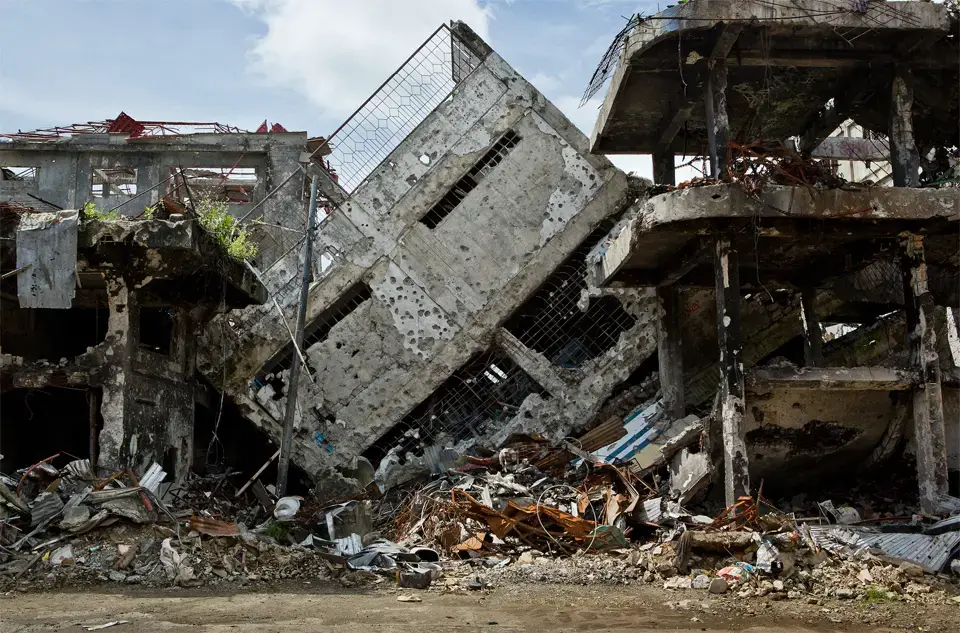 ISIS fighters have left damage in their wake while trying to take hold of cities in the Philippines. Image by David Maurice Smith. Philippines, 2018.