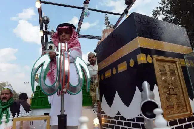A replica of the Kaaba, the Grand Mosque in the holy city of Mecca, was crafted as part of Eid Milad-un-Nabi, the celebration of the birth of the Prophet Mohammed. The celebration took place in Lahore on January 14, 2014. Image from GlobalPost. Saudi Arabia, 2014. Media file: islam.jpg