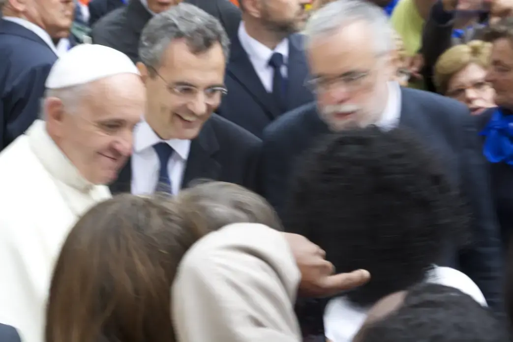 Just one day after announcing that he would no longer use the popemobile, Pope Francis spent about one hour greeting the crowds at his papal Audience on June 15, 2014. Image by Molly K. Dutmers. Italy, 2014. Media file: pope.jpg