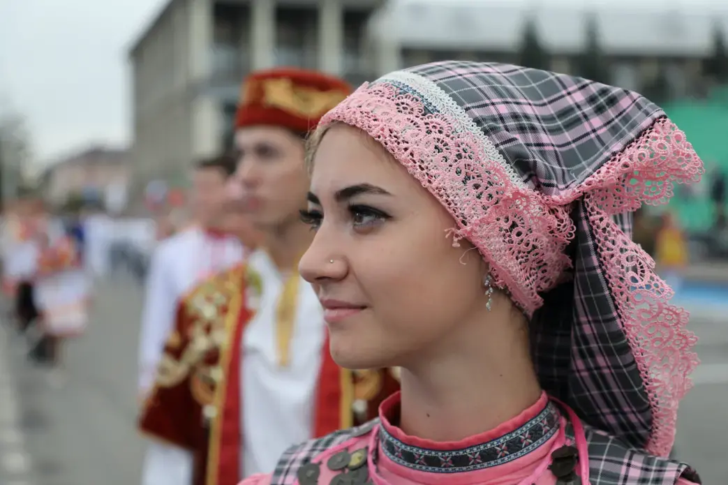 On Oilman's Day in Tatarstan,Russia, a women stands in the national clothing. September, 2018. Tatarstan, Russia. Image by Denis Gaponov /Shutterstock. On Oilman's Day in Tatarstan,Russia, a women stands in the national clothing. September, 2018. Tatarstan, Russia. Image by Denis Gaponov /Shutterstock.