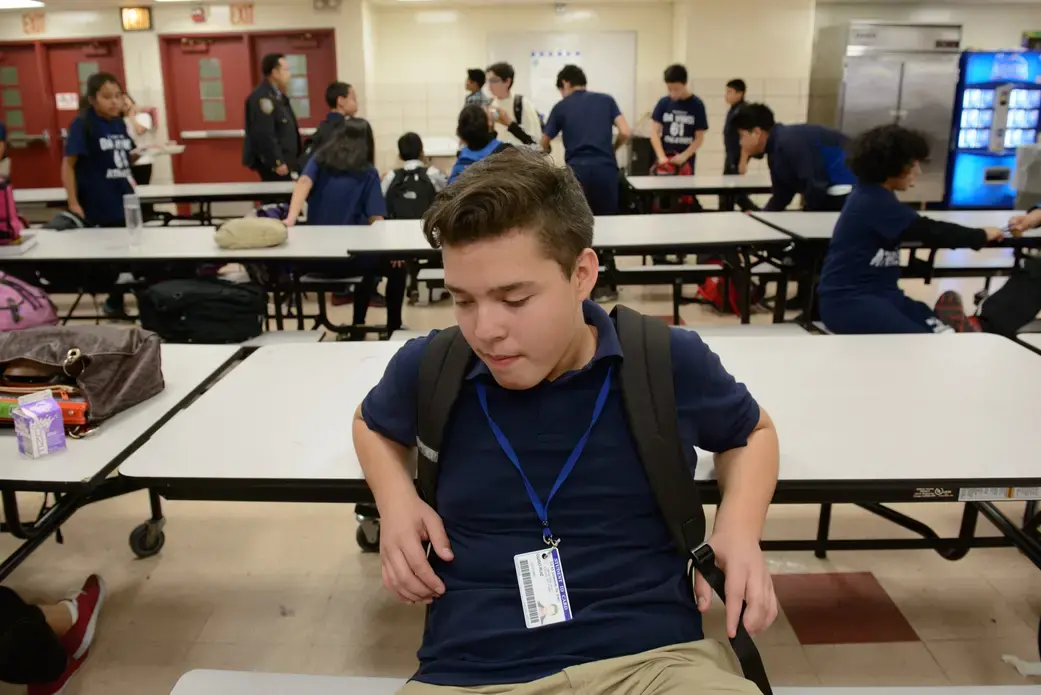 Guido at lunchtime in his middle school cafeteria. Image by Alice Proujansky. United States, 2014. Media file: blanca_1688.jpg