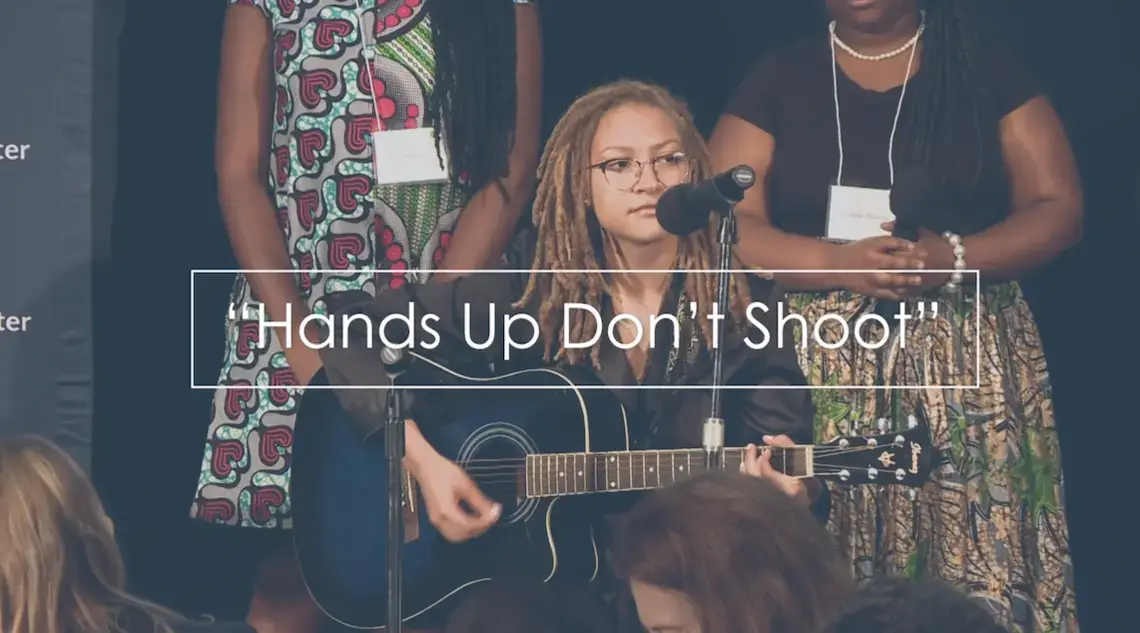 Indigo Passariello, a sophomore from Howard University, performed her song at the Beyond War conference dinner. Image by the National Press Club. Washington, D.C., 2018.