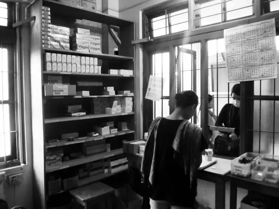 Pictured here is the pharmacy at the Doctors without Borders site in Churachandpur Manipur, where Valganciclovir, otherwise commonly known as Valgan, the medication to treat CMV retinitis (a virus which causes blindness in HIV patients), is accessible for patients, but still remains out of reach for many in India. Image by Aditi Kantipuly. India, 2016. Doctors without Borders site in Churachandpur