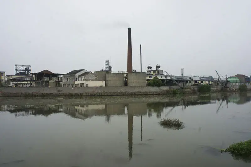 The government has been reluctant to acknowledge the scale of the problem in Zhoutie, where soil has been contaminated with heavy metals discharged by chemical plants like this one. Image by Wu Di. China, 2014. Media file: china_5.jpg