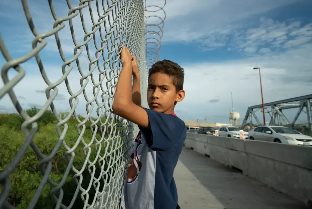 Javier Alejandro Vindel-Rodriguez on the Brownsville Express International Bridge, where U.S. Customs and Border Patrol agents deterred asylum seekers like his family from crossing the border. Image by Reynaldo Leal. United States, 2018. Javier Alejandro Vindel-Rodriguez on the Brownsville Express International Bridge, where U.S. Customs and Border Patrol agents deterred asylum seekers like his family from crossing the border. Image by Reynaldo Leal. United States, 2018.