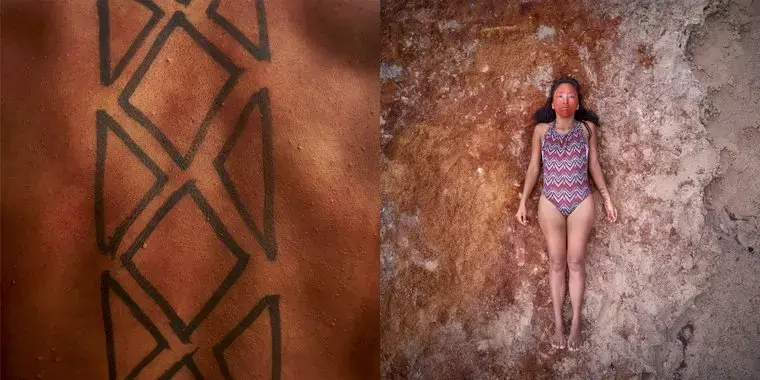 Tupi laying down on the beach in her community. Image by Pablo Albarenga. Brazil, 2019.