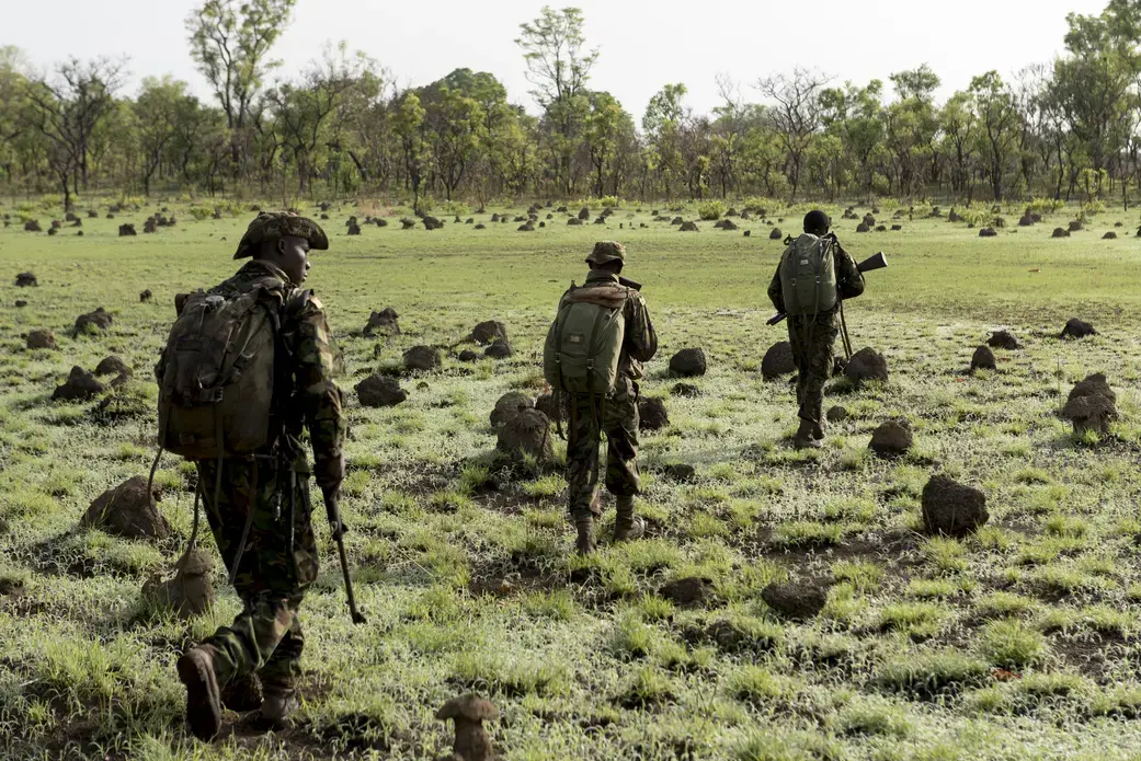 Rangers employed by the Chinko Project, in eastern Central African Republic, set out on a morning patrol to look for poachers and armed cattle herders. Image by Elliott Woods. Central African Republic, 2016. Rangers employed by the Chinko Project, in eastern Central African Republic, set out on a morning patrol to look for poachers and armed cattle herders.