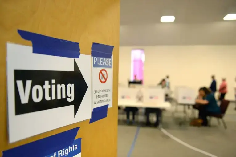 Voters come to their polling places to exercise their right to vote in the Presidential elections in Saint Louis, Missouri. Image by Gino Santa Maria / Shutterstock.com. United States, 2016.
