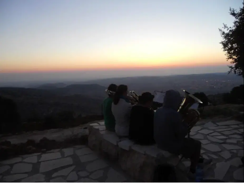 Brass for Peace at sunset. Image by Adrian Fadil. West Bank, 2013. Media file: brass_at_twiight.png