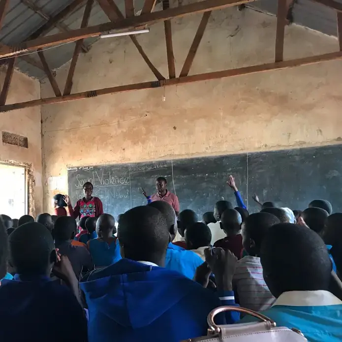 Primary school students participate in an educational session on the topic of sexual violence. Image by Keishi Foecke. Uganda, 2019. Primary school students participate in an educational session on the topic of sexual violence. Image by Keishi Foecke. Uganda, 2019.